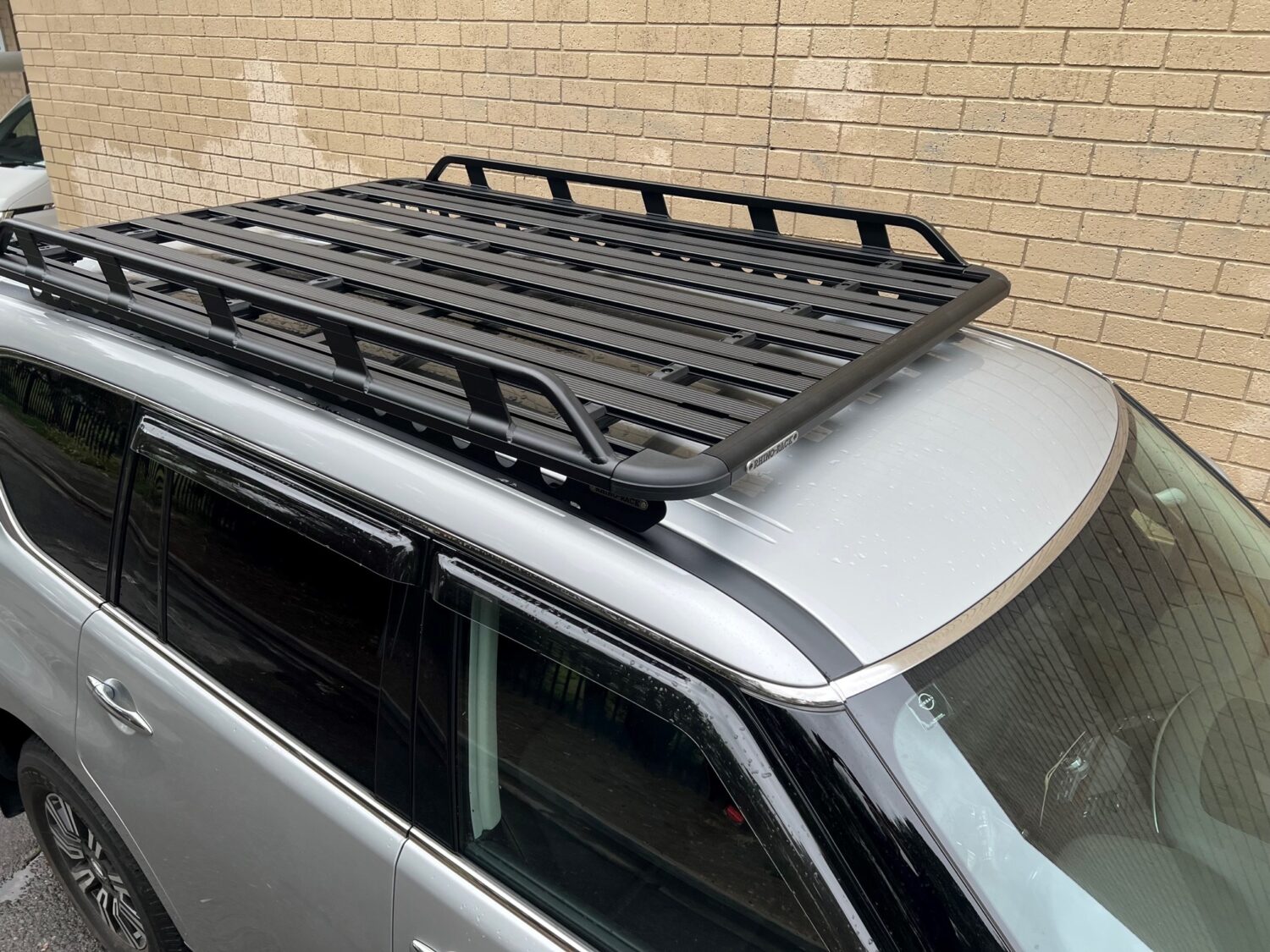 Nissan Patrol Y62 FaceLift 2021on RhinoRack Pioneer Tradie with
