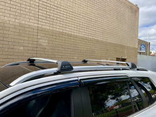 Ford Everest Next Gen Oct 2022on (with raised rails) Yakima Black flush Roof Racks (S27YB/K328) - Image 9
