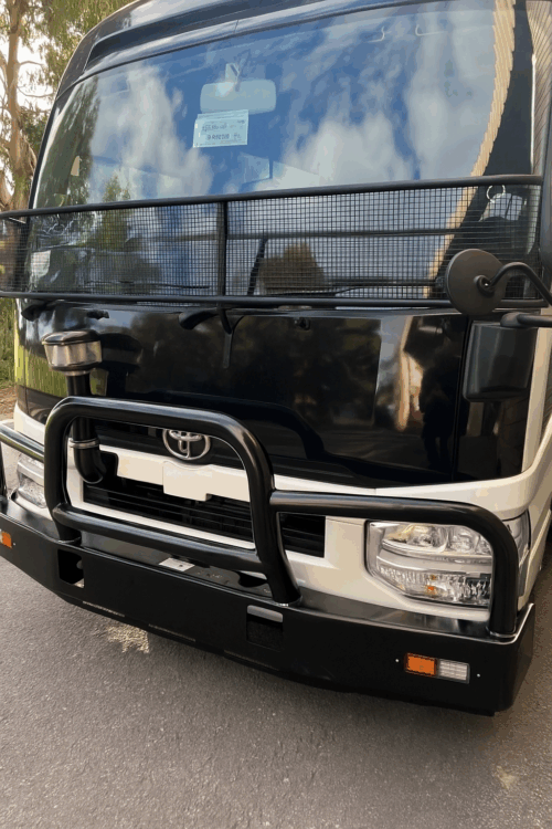 Toyota Coaster Bus 2017onward Black Windscreen Stone Protector - Image 1