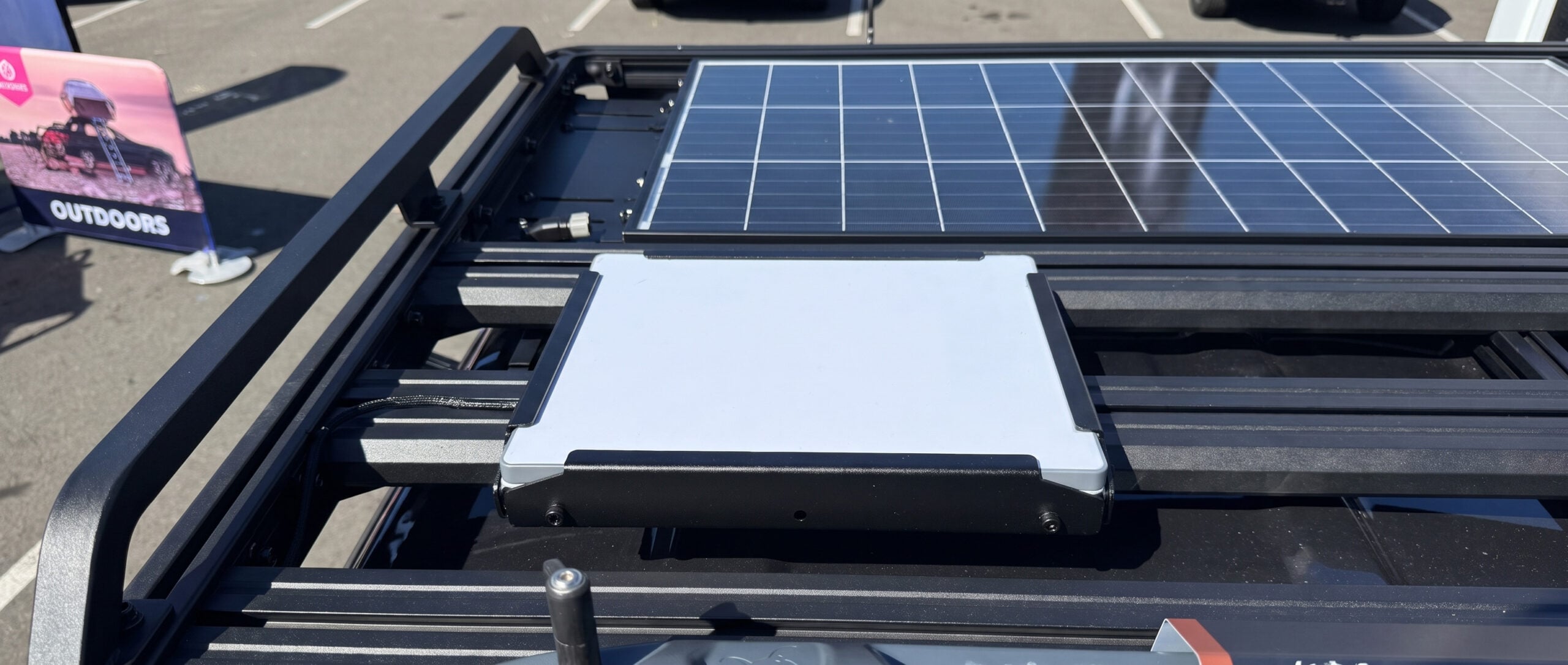 Starlink dish mounted on a vehicle roof rack
